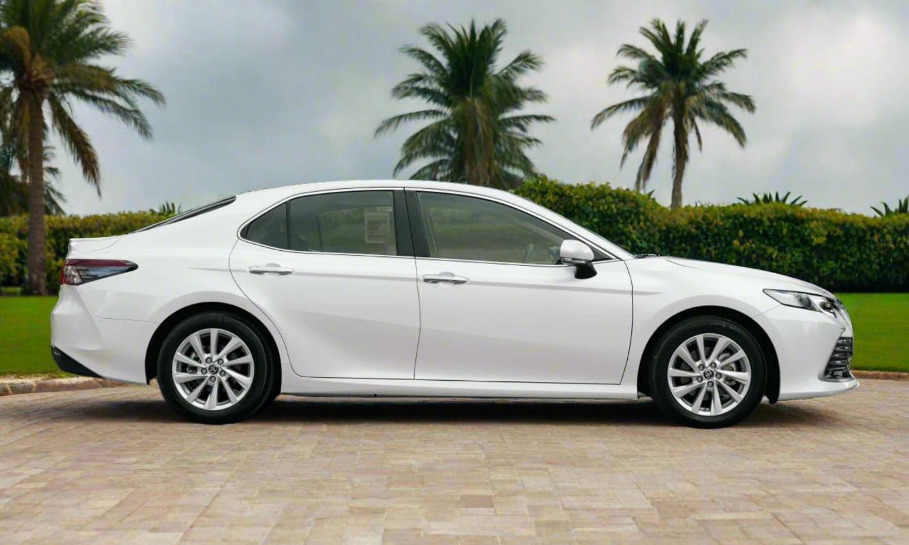 Rent Toyota Camry 2023 White 46551M or similar